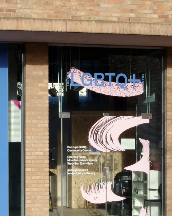 Window of the London LGBTQ+ Community Centre building with the Centre's logo on the glass